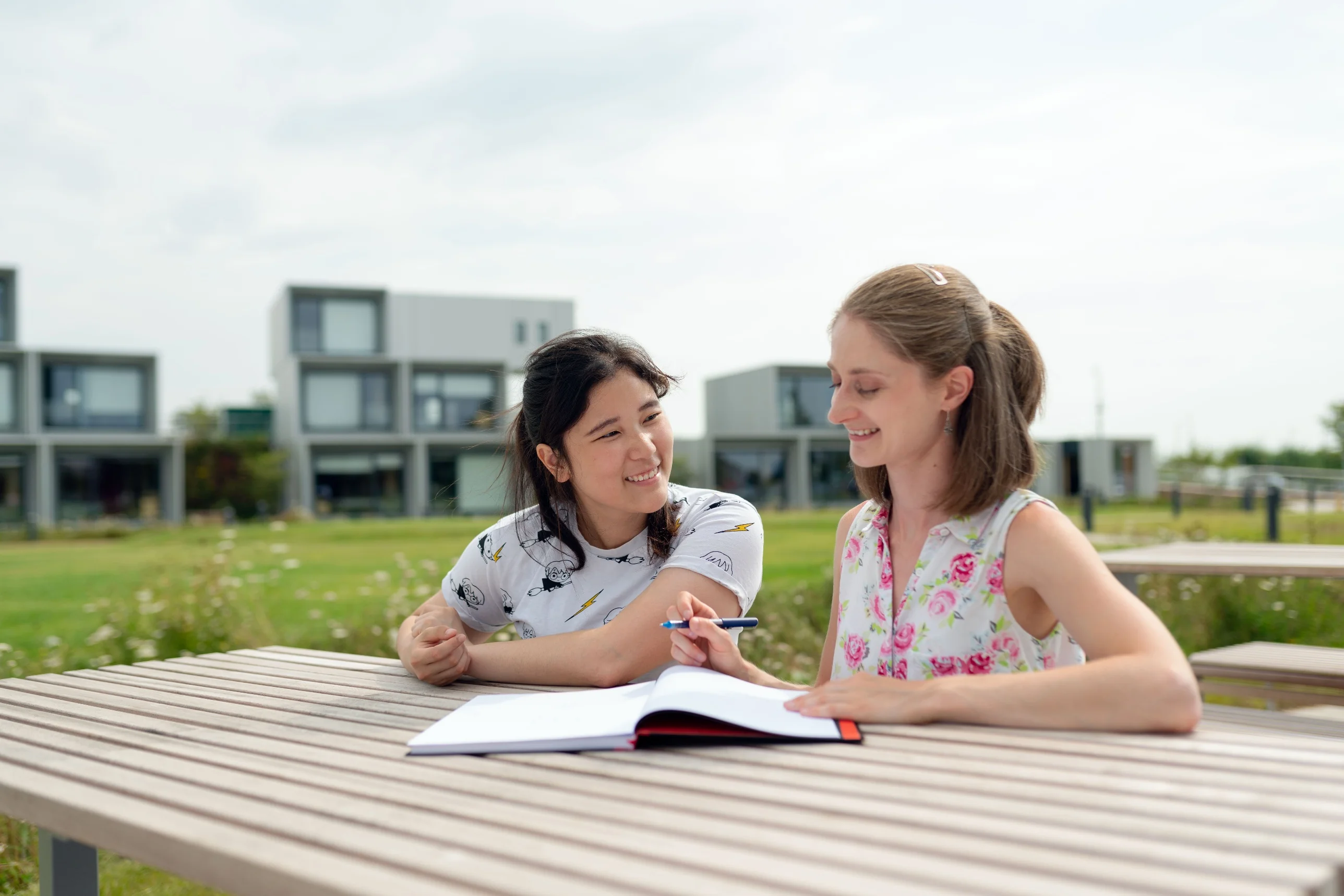 Students studying together at a library table