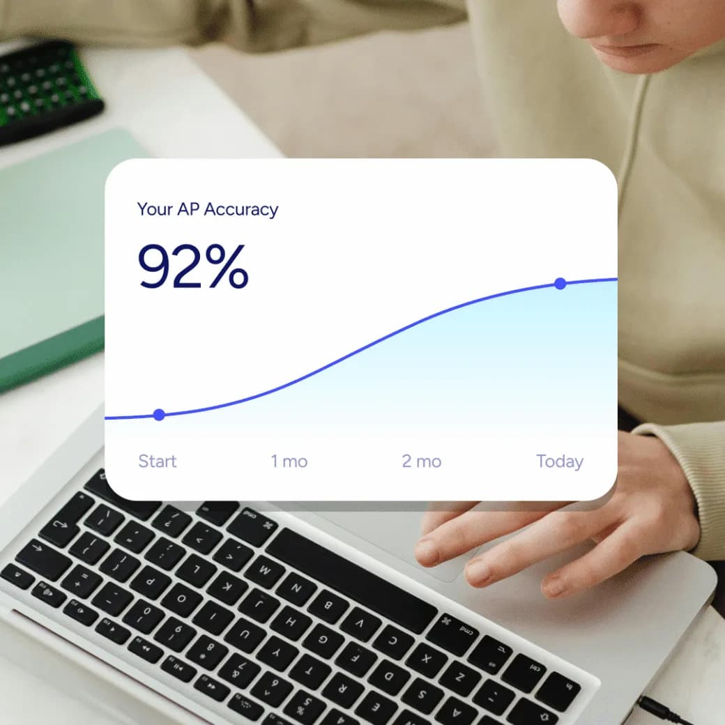 AP accuracy tracking chart showing 92% on a laptop