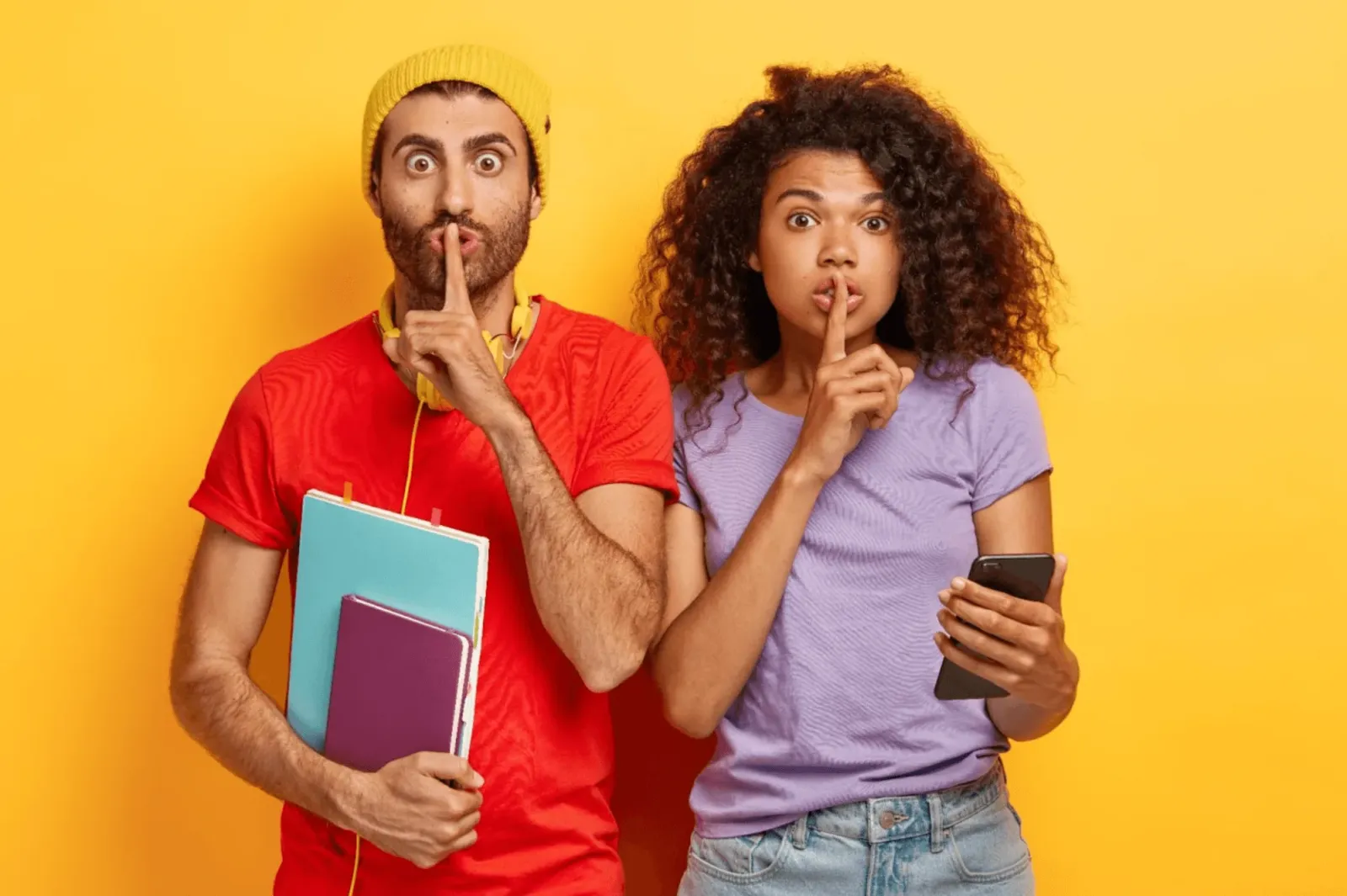 two students shushing