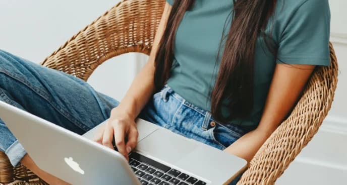 Student using a laptop to study for the SAT